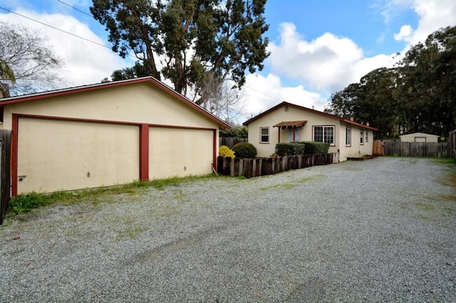 view of home's exterior with a garage