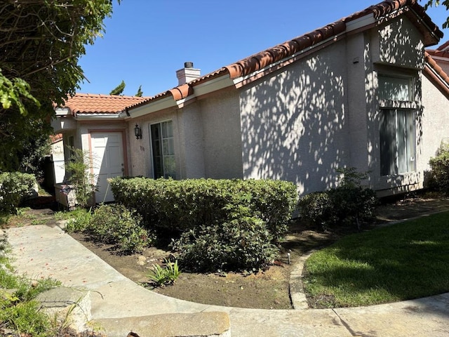 view of home's exterior with a garage