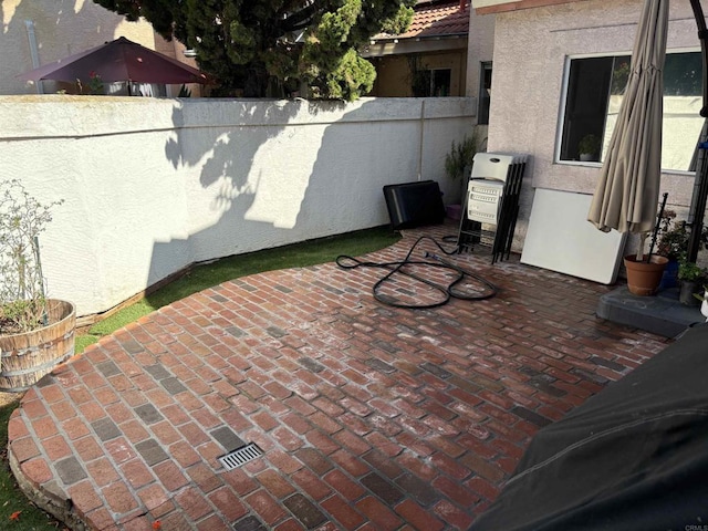 view of patio / terrace with heating unit