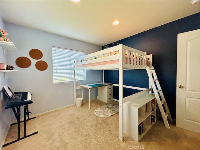 bedroom featuring light carpet