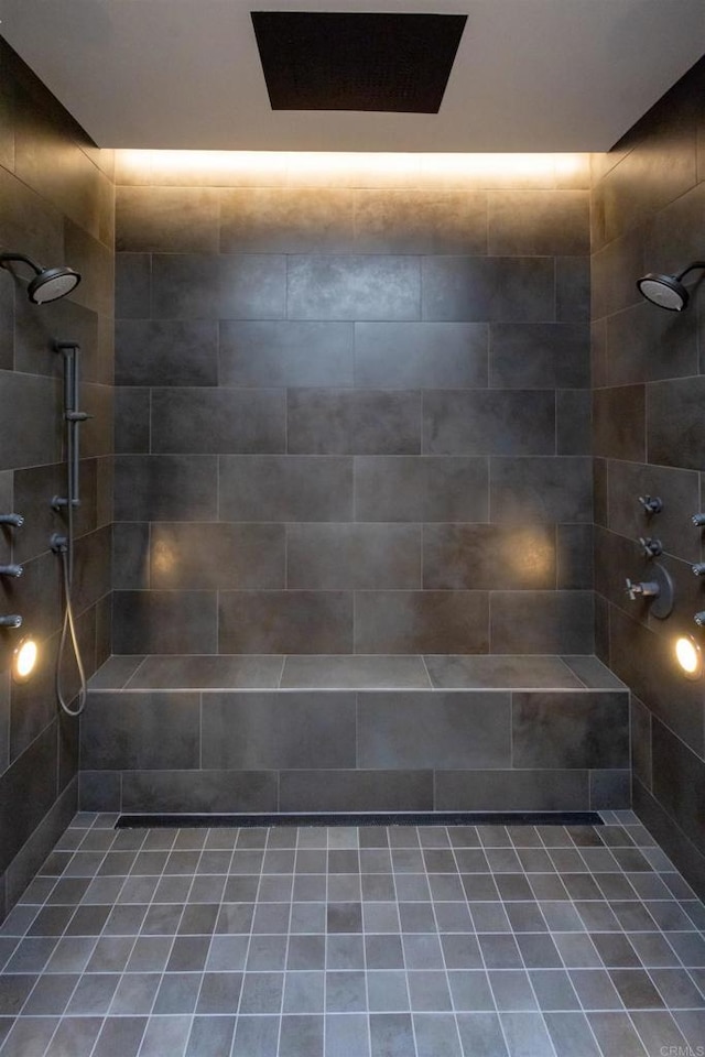 bathroom featuring a tile shower