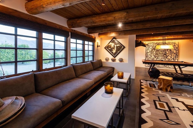 living room with beamed ceiling and wooden ceiling