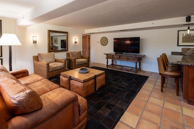 living room with tile patterned flooring