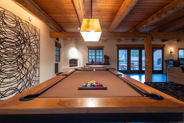 game room featuring wood-type flooring, wooden ceiling, beamed ceiling, and french doors