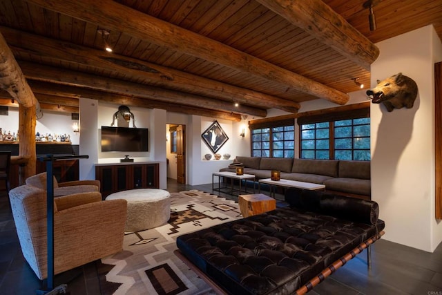 living room with beamed ceiling, bar area, and wooden ceiling