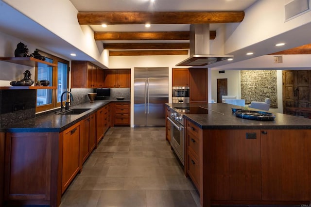 kitchen with high quality appliances, sink, decorative backsplash, beam ceiling, and island range hood