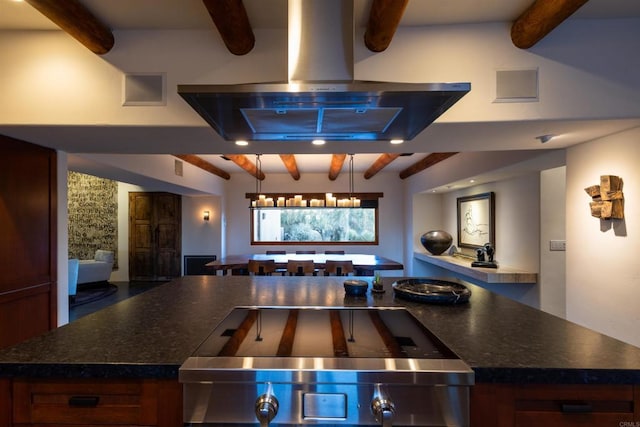 kitchen with island range hood, beamed ceiling, and pendant lighting