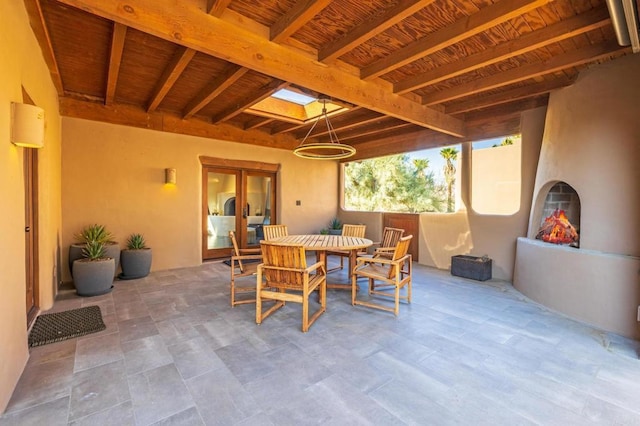 view of patio / terrace with exterior fireplace