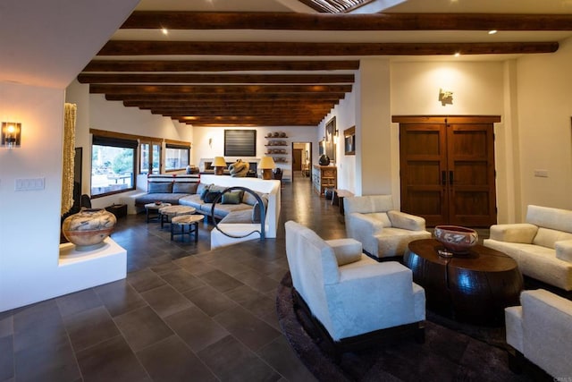 living room featuring beamed ceiling