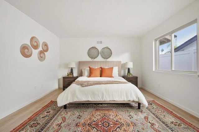 bedroom featuring light wood-type flooring