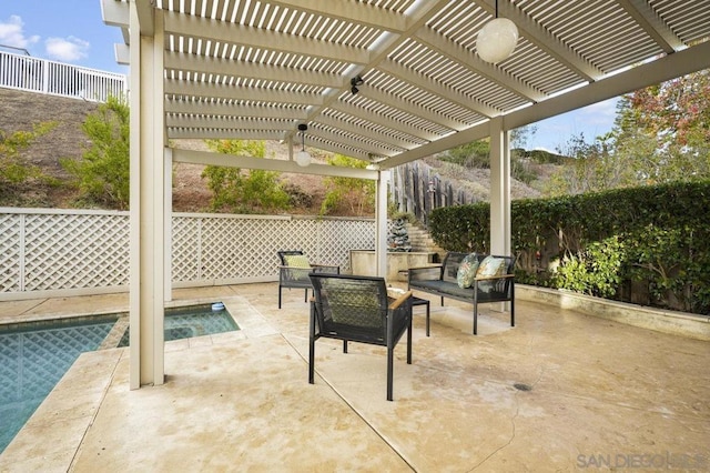 view of patio with a pergola and an outdoor hangout area