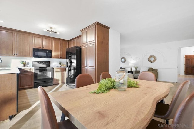 dining room featuring light wood-type flooring