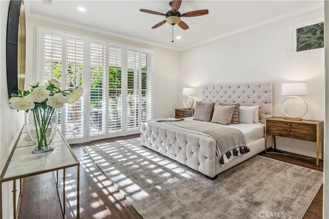 bedroom featuring access to outside, ceiling fan, ornamental molding, and dark hardwood / wood-style floors