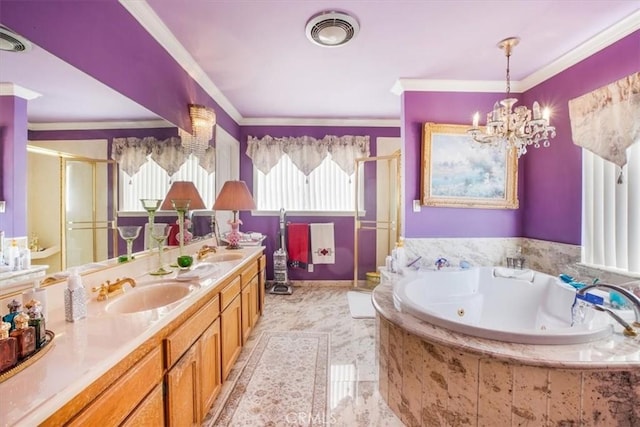 bathroom with vanity, a healthy amount of sunlight, shower with separate bathtub, and an inviting chandelier