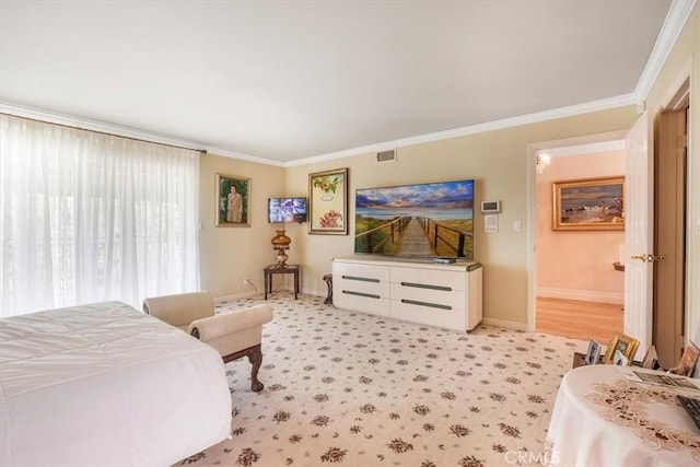 bedroom with crown molding