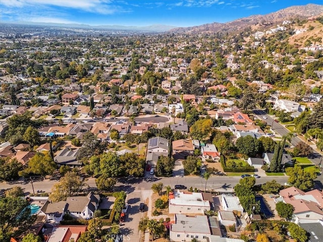 drone / aerial view featuring a mountain view