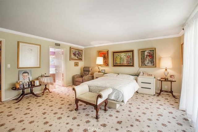 carpeted bedroom featuring connected bathroom and ornamental molding