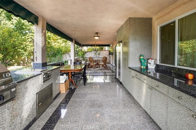 view of patio with area for grilling