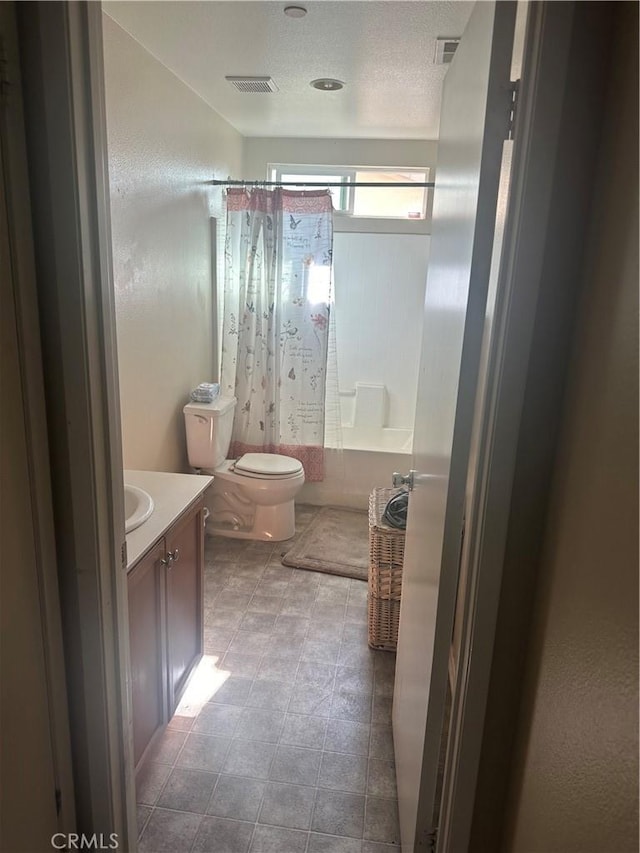 full bathroom with vanity, toilet, and shower / bathtub combination with curtain