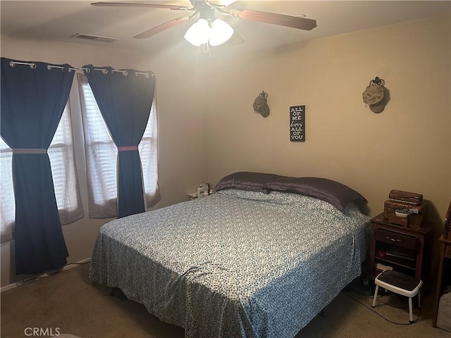 bedroom featuring carpet and ceiling fan