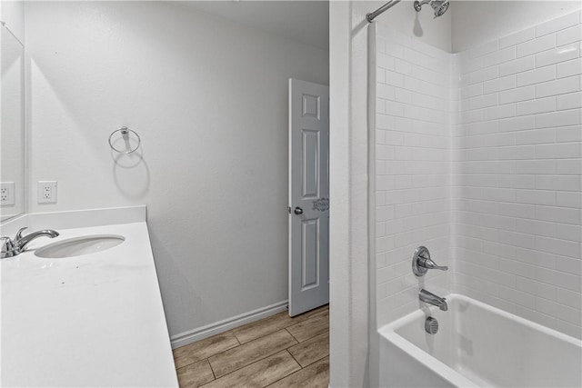 bathroom with bathtub / shower combination and vanity