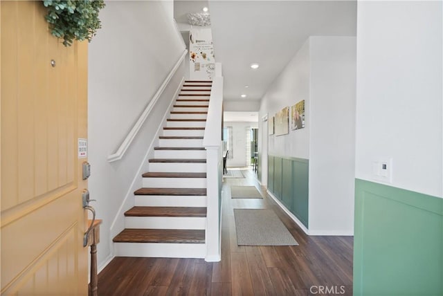 stairway with wood-type flooring