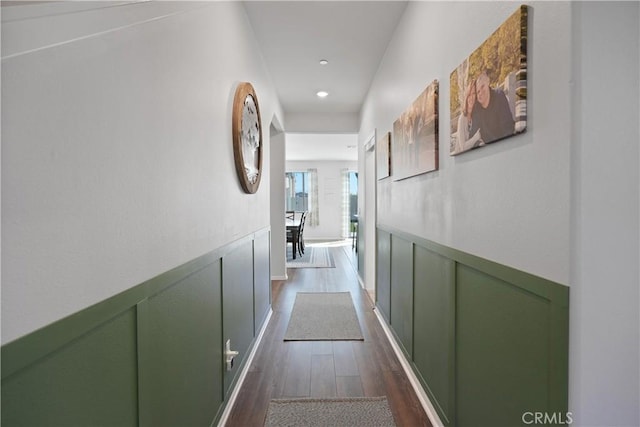 hallway with dark hardwood / wood-style floors