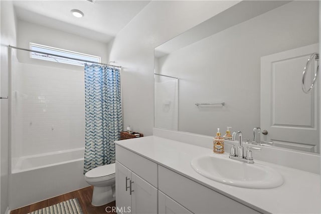 full bathroom with toilet, vanity, shower / bath combo, and hardwood / wood-style flooring