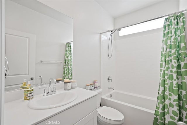 full bathroom with shower / bath combo, toilet, and vanity