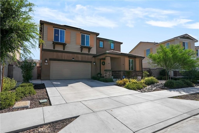 view of front of property with a garage