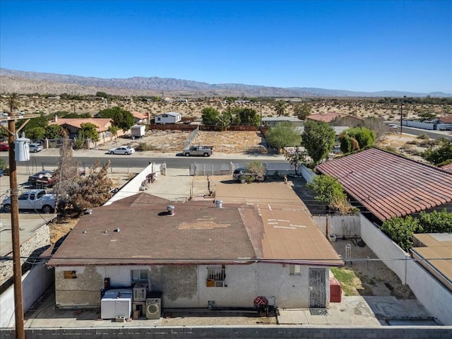 drone / aerial view featuring a mountain view