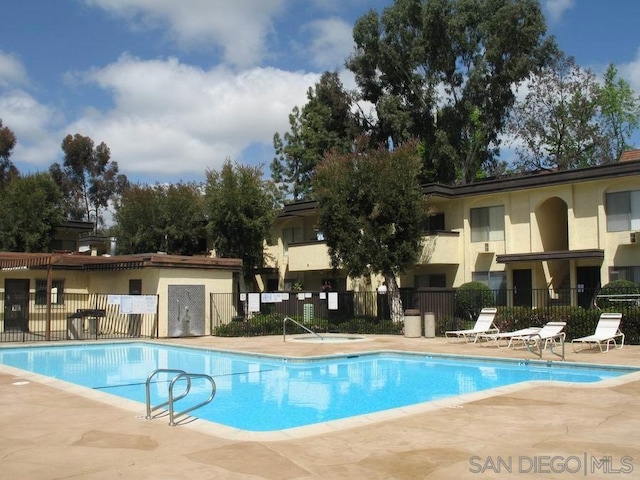 view of pool featuring a patio area