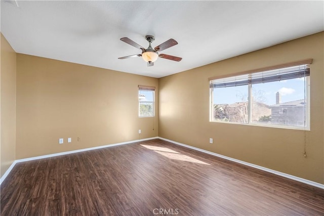 spare room featuring ceiling fan and wood-type flooring