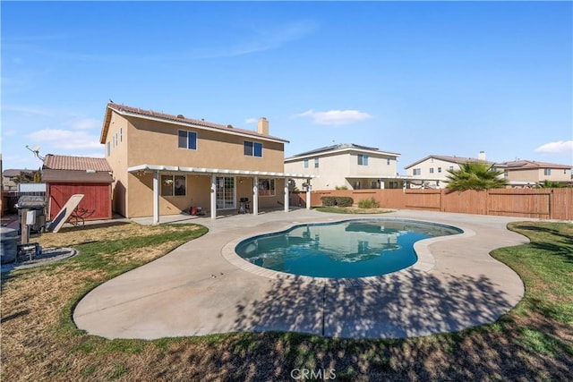 view of swimming pool with a patio area