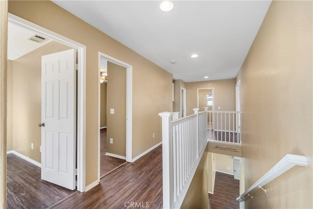 hall with dark hardwood / wood-style floors