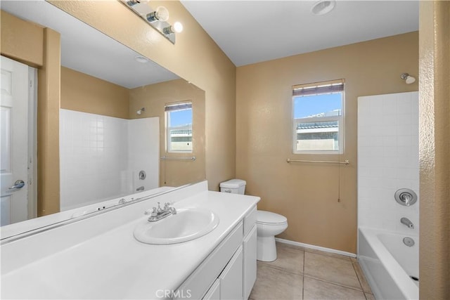 full bathroom featuring toilet, vanity, tile patterned floors, and  shower combination