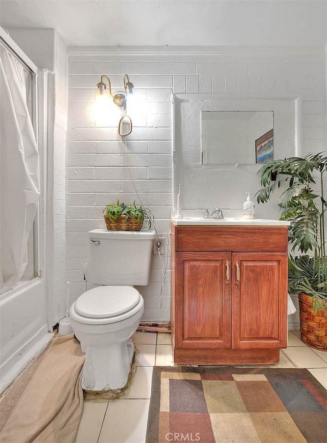 full bathroom with toilet, shower / bathing tub combination, tile patterned floors, and vanity