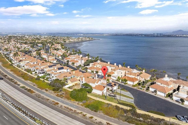 drone / aerial view with a water view