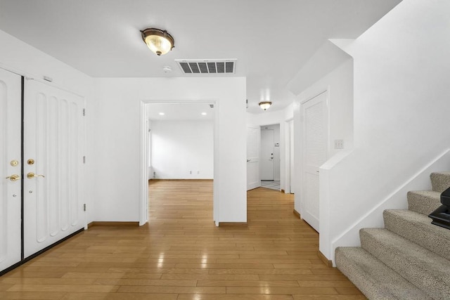 entrance foyer featuring light hardwood / wood-style flooring