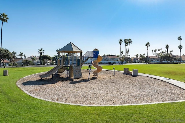 view of playground with a yard