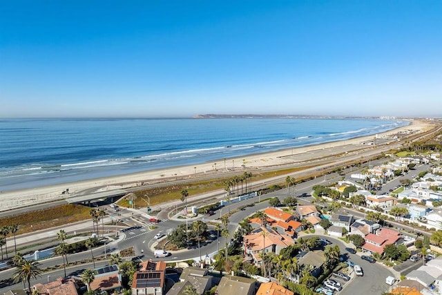 drone / aerial view with a view of the beach and a water view