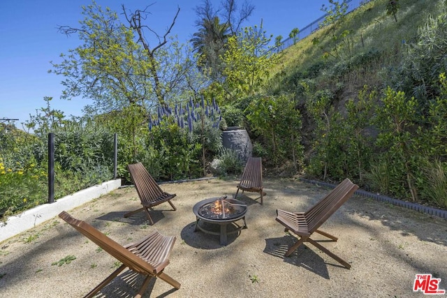 view of patio featuring a fire pit