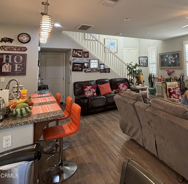 living room with hardwood / wood-style flooring