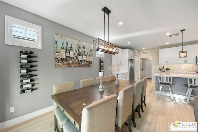 dining room with light wood-type flooring