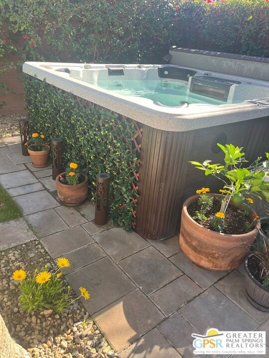 view of patio featuring a hot tub