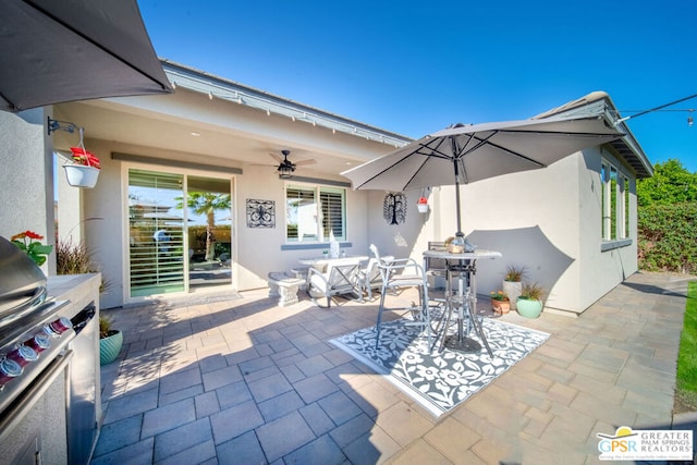 view of patio with ceiling fan