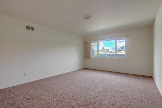 spare room with carpet floors