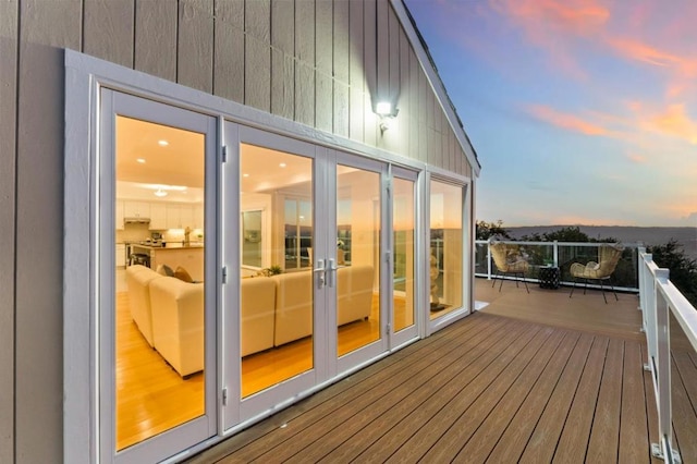 deck at dusk with french doors