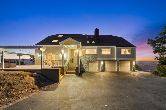 view of front of home with a garage