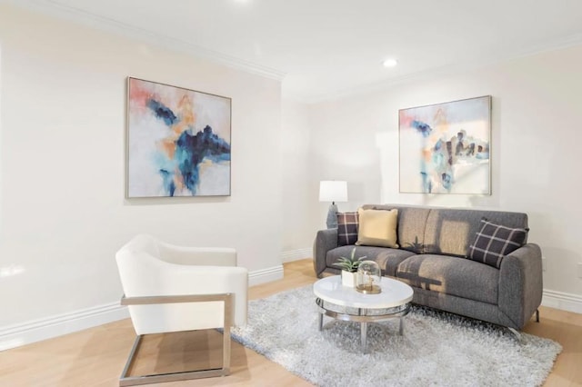 living room featuring ornamental molding and hardwood / wood-style floors